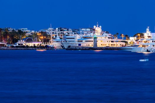 Evening in Cannes - city panorama accros the bay. Cannes, Provence-Alpes-Cote d'Azur, France