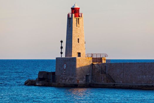 Nice Lighthouse at sunset. Nice, French Riviera, France.