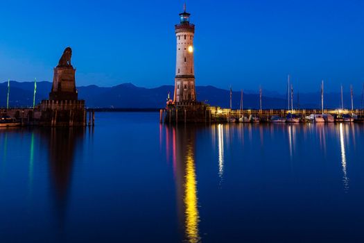 Lindau Lighthouse at sunrise. Lindau, Bavaria, Germany.