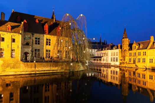 House and canals in Bruges. Bruges, Flemish Region, Belgium