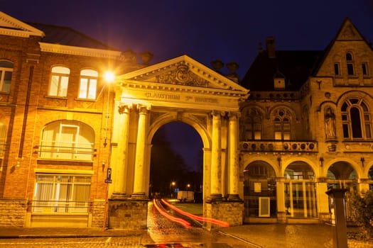 Arch in Ypres at night. Ypres, West Flanders, Flemish Region, Belgium
