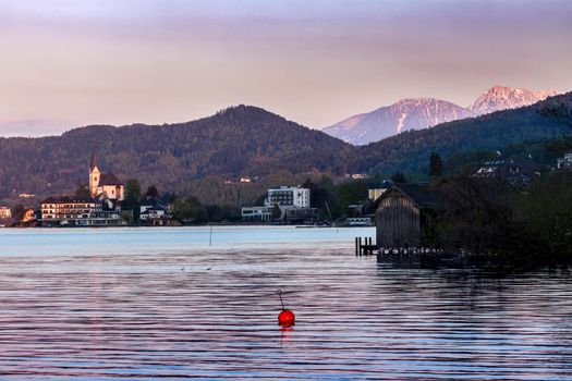 Saints Primus and Felician Church in Maria Worth at sunset. Maria Worth, Carinthia, Austria.