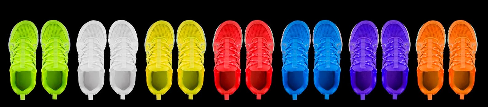 Sneakers in different colors on a black background. Seamless texture of multi-colored shoes.