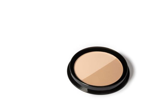 Loose powder for face isolated on a white background. Cosmetic basis for the face. Toning cosmetic product.