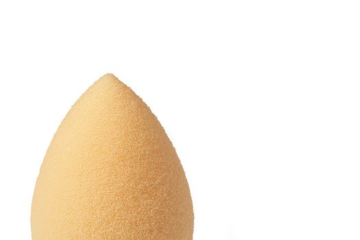 Cosmetic face sponge isolated on a white background.