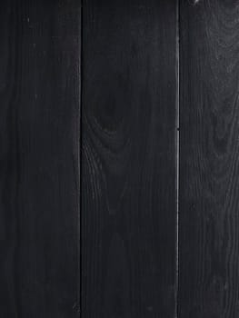 Black wood texture. Background dark boards.