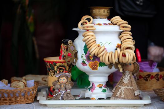 Belarus, the city of Gomil, February 24, 2020. Maslenitsa holiday.Russian samovar and a lot of bagels. Symbols of Russia.