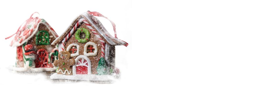 New Year banner. Gingerbread man on the background of a fabulous house.