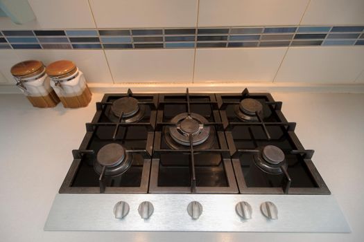 Gas panel built into the kitchen. Six-burner stove