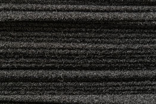 Black carpet for sale. Carpets placed on top of each other