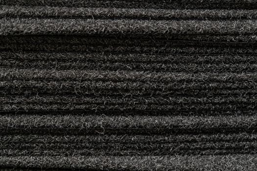 Black carpet for sale. Carpets placed on top of each other