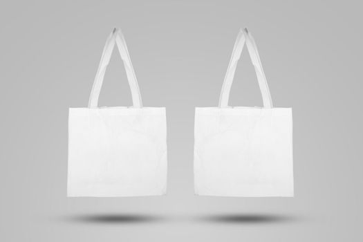 Mockup white tote bag fabric for shopping, mock up canvas bag textile with reusable.