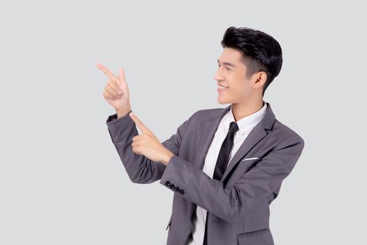 Portrait young asian business man pointing and presenting isolated on white background, advertising and marketing, executive and manager, male confident showing success, expression and emotion.