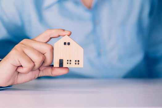 Insurance house for security and care, real estate, costs and loan and mortgage, protection of home and advisor with investment in residential, assurance of property for finance, business concept.