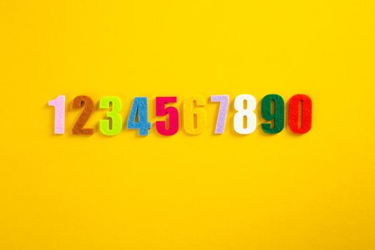 Set of colorful number on yellow background