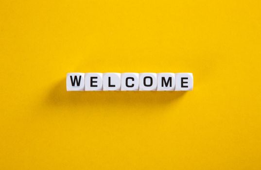 Welcome word on yellow background