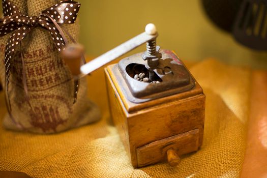 An old coffee grinder. Ancient machine for grinding coffee.