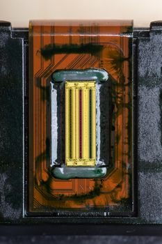 closeup nozzle plate of ink cartridge, computer and technology concept