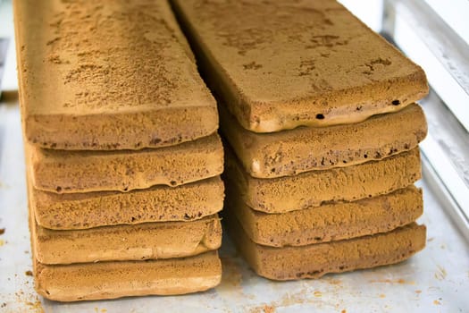 Sheets of biscuit for baking cake. Many layers of biscuit.Semi-finished cake