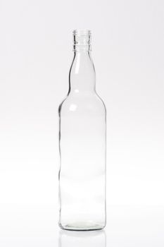 clear glass bottle isolated on white background