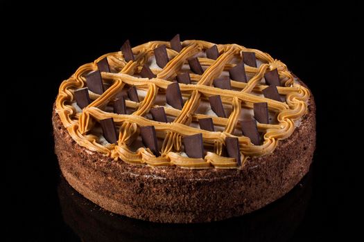 Chocolate cake on a black background