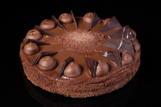 Chocolate cake on a black background