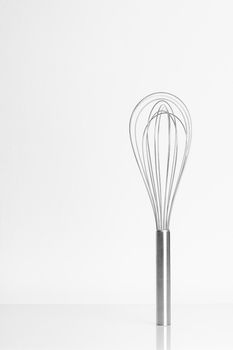 isolated Whisk on white background, cooking equipment