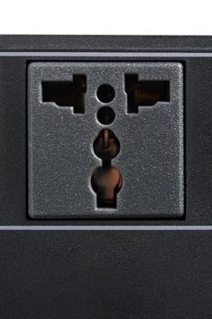 closeup black universal plug socket without plug