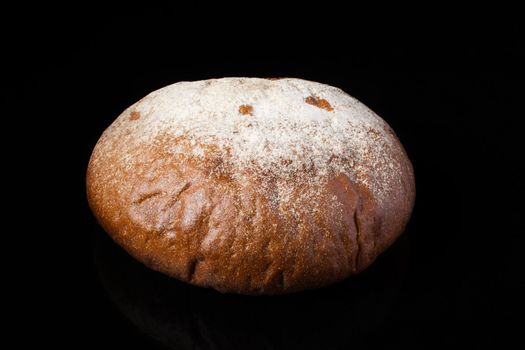 Bread on a dark background.Loaf