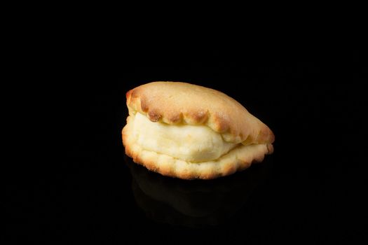 Cookies with cottage cheese on a black background