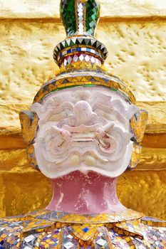 closeup face of Yak(giant) statue during restoration process at Wat Phra Kaew in Bangkok, Thailand.