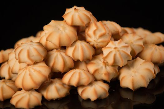 Shortbread cookie closeup on a dark background