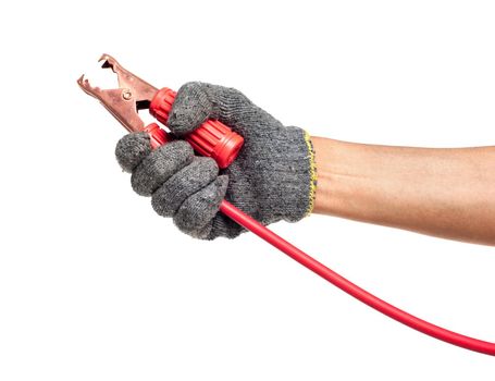 human hand holding red jumper cable for car battery