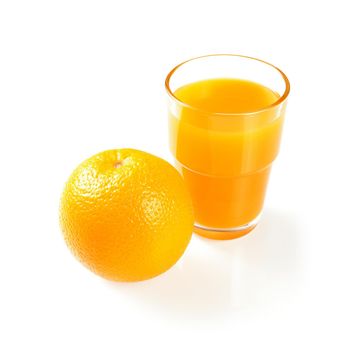 Ripe orange and cup of orange juice