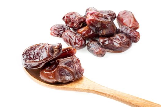 closeup sweet dried dates fruit isolated on white background