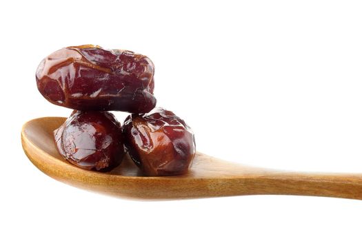 closeup sweet dried dates fruit isolated on white background