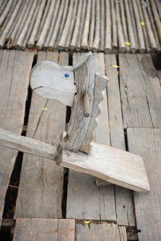 vintage seesaw board with cute horse head in Thailand