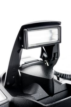 closeup details of professional digital camera built-in flash