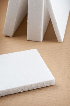 closeup white foam on cardboard