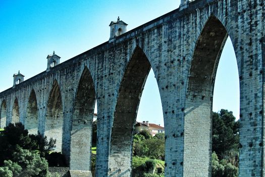 Beautiful stone aqueduct called Aguas Livres in Lisbon, Portugal.