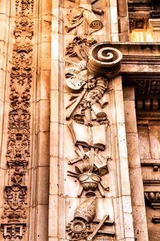 Beautiful carved stone details on the wall of the main facade of the Cathedral of Murcia.