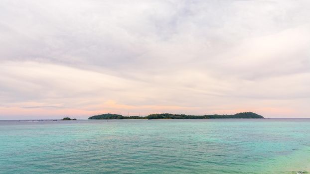 Beautiful nature landscape of the Andaman Sea surrounds Ko Lipe island under the sky during the sunset in summer at Tarutao National Park, famous attractions of Satun, Thailand, 16:9, widescreen
