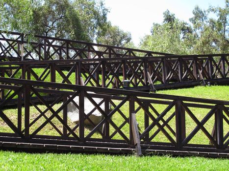 Hanging Wooden bridge in a forest along the trekki