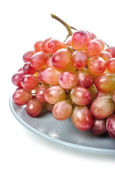 isolated fresh red grapes bunch on white background