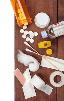 variety of medical object on wooden plank background