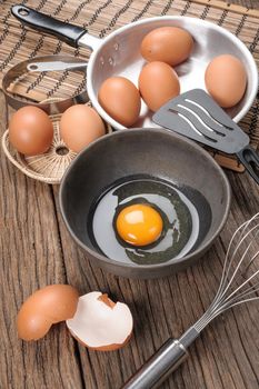 closeup group of fresh eggs on wooden plank