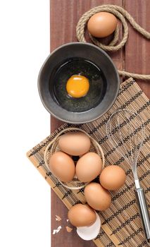 closeup fresh eggs isolate on wooden plank background