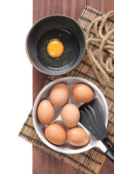 closeup fresh eggs isolate on wooden plank background