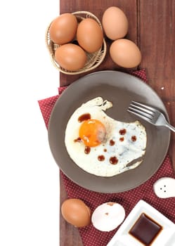 closeup fresh eggs isolate on wooden plank background