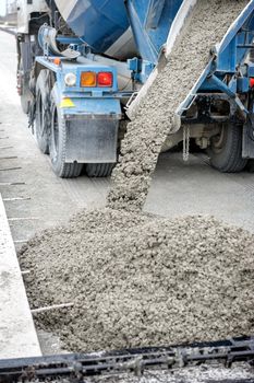 mixed concrete pouring at construction site, Construction industry concept